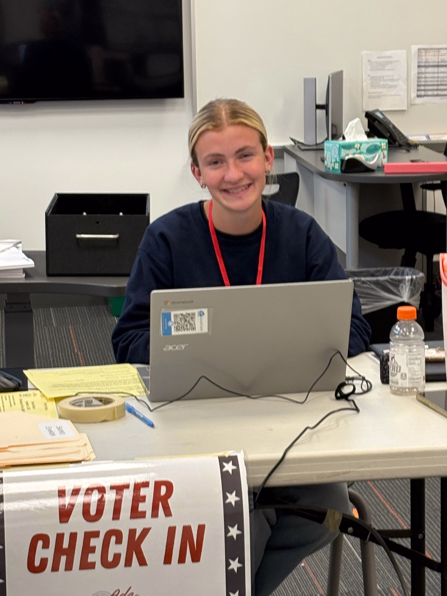 Mackenzie McGrane, high school senior, works as a poll worker for the Boise School District Election, September 1, 2026