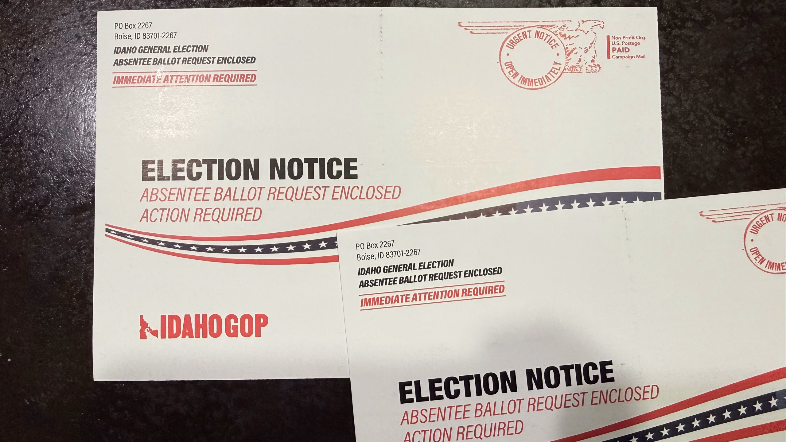 Two Idaho GOP mailers marked "Election Notice: Absentee Ballot Request Enclosed, Action Required"